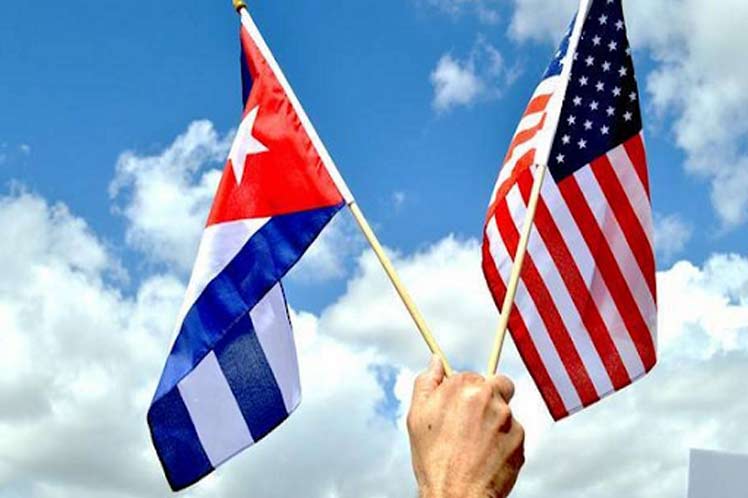 Photo Caption: Cuba-USA Collaboration. in health, beyond differences.