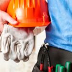 Workers of electricity sector take part in a conference on safety and health at work